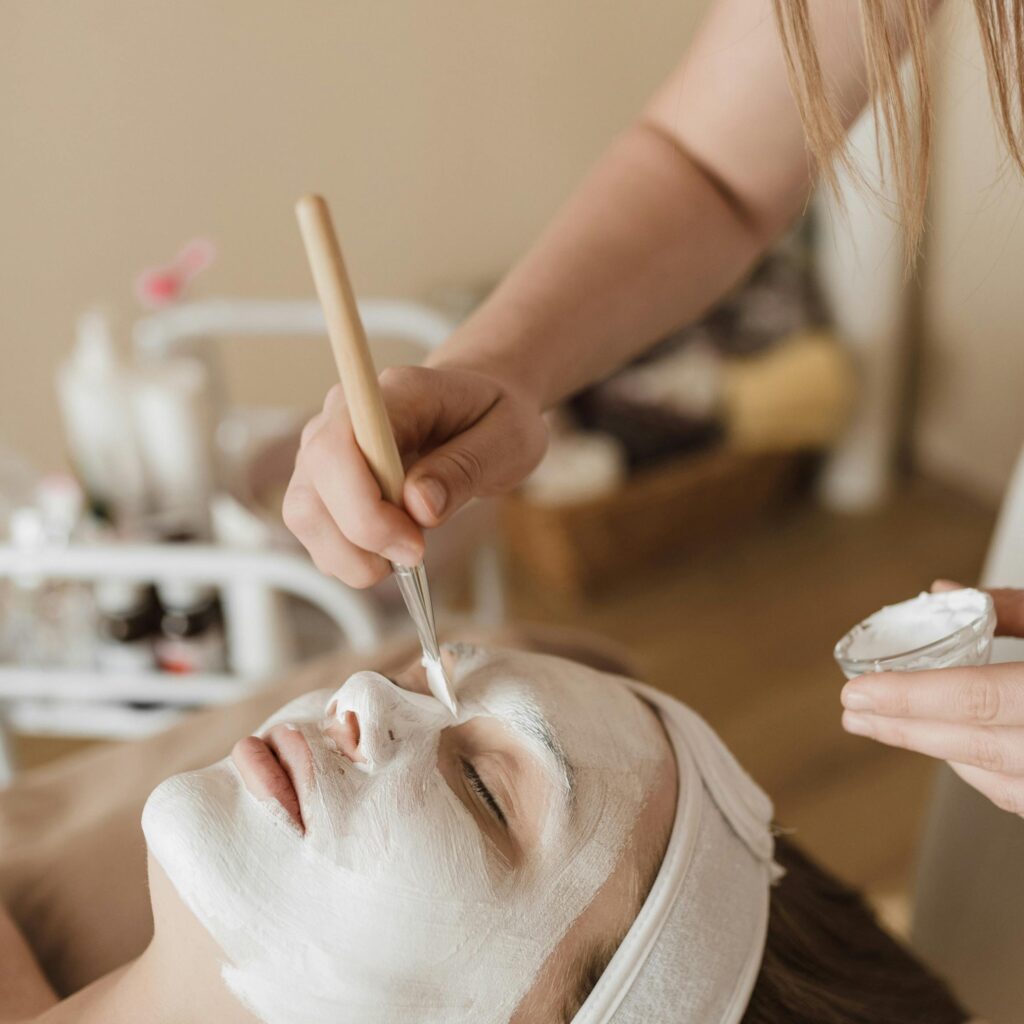 A soothing facial mask application during a spa treatment, promoting relaxation and skincare.